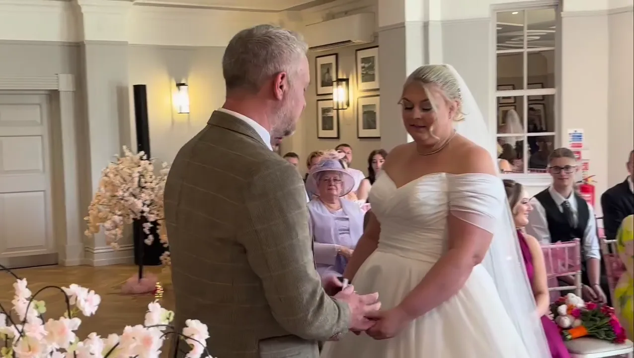 Couple facing each other during the ceremony